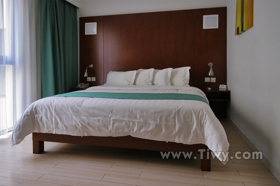 Кровать в гостинице Wuxi Ramada Encore